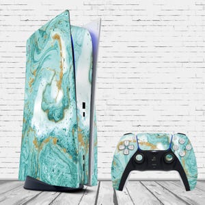 May include: A teal and gold marble design console and controller for the Playstation 5 gaming system.