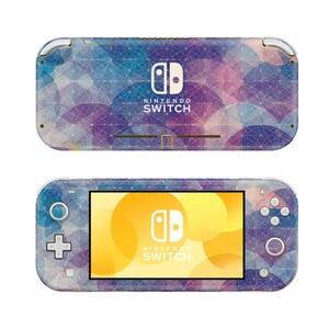 May include: A Nintendo Switch Lite console with a geometric pattern in shades of blue, purple, and pink. The console features the Nintendo Switch logo and a yellow screen. The design covers the entire console, including the buttons and screen.