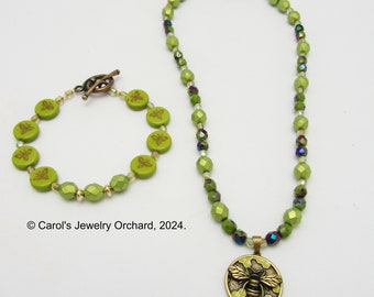 Handmade beaded necklace with lime green bee-themed Czech Glass beads. A matching Bracelet is available. One of A Kind spring themed jewelry