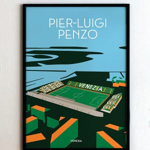 May include: A framed art print featuring a stylized illustration of the Pier-Luigi Penzo stadium in Venice, Italy. The artwork showcases the stadium's green field, stands, and surrounding structures in green, orange, and white against a blue sky. Text includes "PIER-LUIGI PENZO" and "VENEZIA".