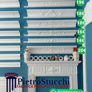 May include: A white plaster molding display with various sizes and styles. The molding is arranged in rows on a blue wall. The molding is labeled with prices in euros. The text "PietroStucchi FABBRICA MANUFATTI IN GESSO" and a WhatsApp icon with the number "3483880946" are at the bottom of the image.