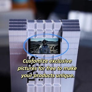 TARS Robot Desktop Ornament with gift customization options, ideal for Christmas and New Year gifts. A sci-fi collectible for movie lovers, featuring personalized messages and classic movie scene playback. Great addition to home decor for fans.