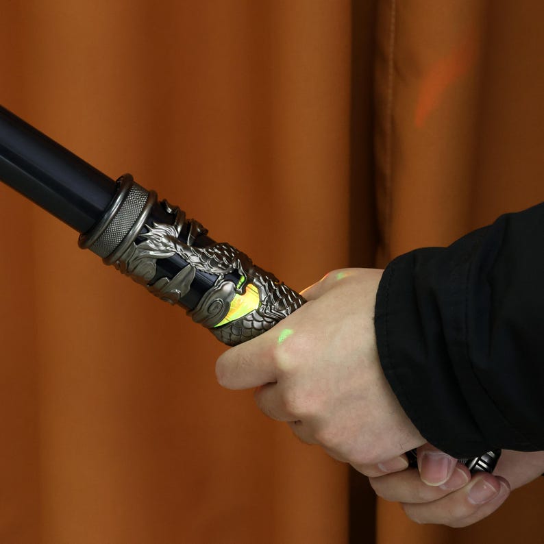 High-quality ABS plastic staff with LED color effects, air-control extension, and rechargeable Type-C battery. Ideal for cosplay costumes, Black Myth Wukong fans, and dynamic props for performance and fantasy-themed events.
