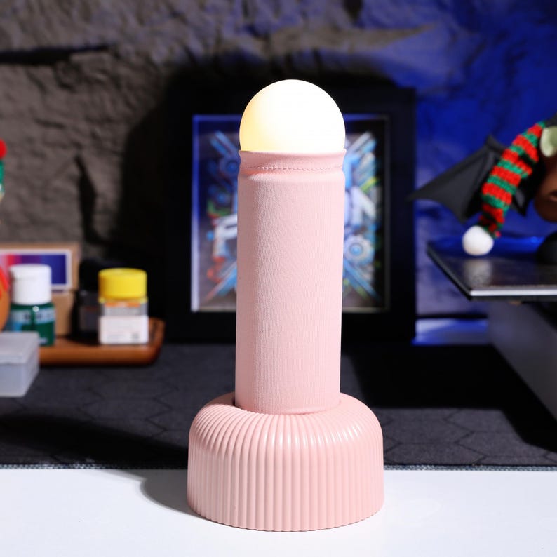 LED night light for a calming, flicker-free glow, perfect for game rooms or as a unique addition to bedroom decor. Rechargeable, long-lasting, and stylish with a soft-touch finish for comfort and aesthetics.