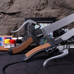 Custom 3D printed sword replica for anime cosplay, dual blades with removable pieces, lightweight PLA material with a metallic finish. Ideal for fans of Attack on Titan, cosplay costume accessories, or unique anime-inspired home decor.