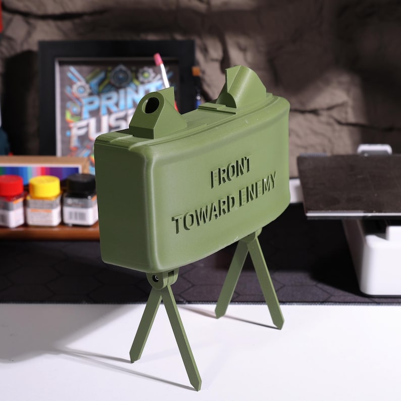 Realistic claymore Bluetooth speaker, military sound decor, personalized audio gift, claymore mine speaker, high-quality 3D printed speaker, unique home decor, military-inspired desk accessory, speaker for veterans, Bluetooth device with claymore