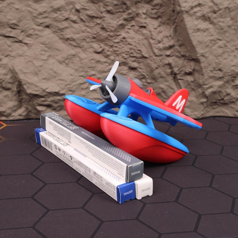 Floating seaplane in action during kids’ bath time, capturing its buoyant design and realistic airplane look. Crafted with vibrant, child-safe plastic and 3D printed to ensure long-lasting durability. Ideal as a holiday gift, stocking stuffer, or aviation-themed decoration. Excellent for educational purposes, introducing children to science and physics through water play. This versatile toy also functions as a cute desk ornament for aviation lovers, making it a popular choice for Christmas