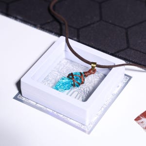 Final Fantasy XIV DIY jewelry kit – Complete crafting set for making a custom pendant or keychain. Ideal for collectors of gaming jewelry or cosplay accessories inspired by Final Fantasy XIV.