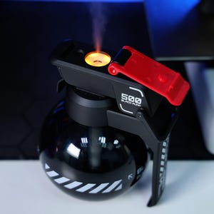 Cool and practical grenade humidifier with multicolor LED lighting, ideal for desk, office, or home use. Moisturizes dry air, helps with skin hydration, and adds a fun, unique design to any room.