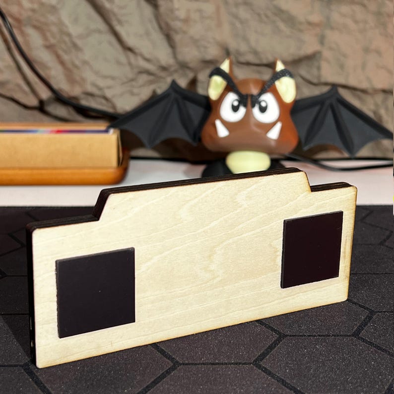 A stunning set of magnetic fridge art inspired by Monster Hunter, featuring a detailed wooden depiction of Rathalos, a legendary creature from the game. This handcrafted magnetic display piece is made from solid wood and incorporates a hidden magnetic layer to securely attach to metal surfaces such as refrigerators. The vibrant colors and intricate wood detailing capture the essence of Rathalos and bring an epic gaming vibe to your kitchen or living room.