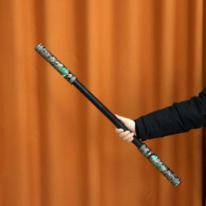 Rechargeable extendable staff with colorful LED lights, air-control stretch, and dynamic sound effects, great for cosplay events, Wukong fantasy Replica, and immersive props for fans of Monkey King, gaming, and unique gifts.