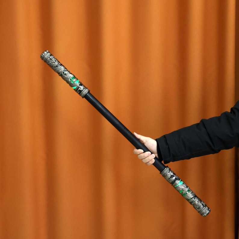 Rechargeable extendable staff with colorful LED lights, air-control stretch, and dynamic sound effects, great for cosplay events, Wukong fantasy Replica, and immersive props for fans of Monkey King, gaming, and unique gifts.