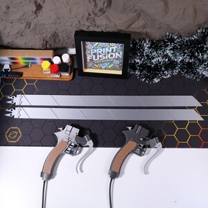 Lightweight PLA dual replica prop with spring-loaded button mechanism for cosplay. Perfect for fans looking for high-quality cosplay props and Attack on Titan-inspired collectible s. Great as a gift for anime lovers.