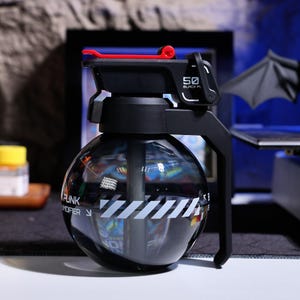 Unique grenade humidifier with LED lighting, ideal for dry environments, helping relieve skin irritation and throat dryness. USB-powered, portable, and efficient mist output for creating a relaxing atmosphere in any room.
