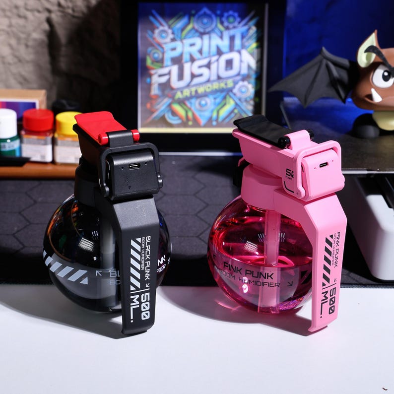 Stylish and portable USB-powered humidifier for gaming rooms, home offices, or bedrooms, featuring LED lights and a unique grenade design. Helps to moisturize dry air and adds a cool touch to any modern space.