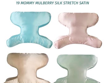 May include: Four butterfly-shaped pillowcases in light blue, pale pink, beige, and sage green. The text PILLOWCASE 19 MOMMY MULBERRY SILK STRETCH SATIN is displayed above the items. Each pillowcase features a smooth, satin-like finish.