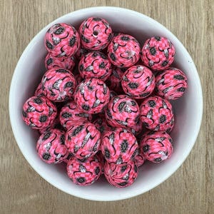Contas redondas de silicone de 15 mm com estampa xadrez rosa e caveiras de touro