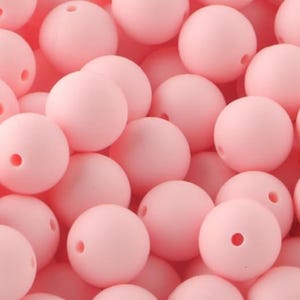 Contas redondas de silicone rosa claro para bebê de 15 mm