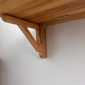 Scrivania pieghevole da parete in faggio naturale / tavolo a scomparsa salvaspazio immagine 13