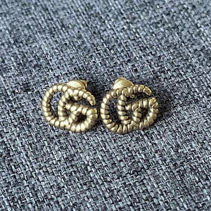 Pendientes dorados con monograma Gucci Vintage GG y logotipo estampado, de época, de VTG