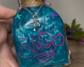 Poción de maleficio de inspiración arcana