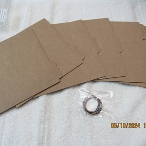 Libro de cartón con anillas para hacer scrapbooking