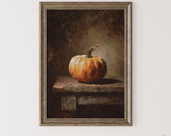 May include: A framed still life painting of a pumpkin. The pumpkin is orange and sits on a weathered wooden table. The background is a dark, blurred mix of browns and greens, creating a classic, rustic aesthetic.
