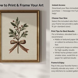 May include: Framed botanical art print featuring a sprig with green leaves, red berries, and a brown ribbon. The artwork is in a gold frame. Text on the image reads "How to Print & Frame Your Art".