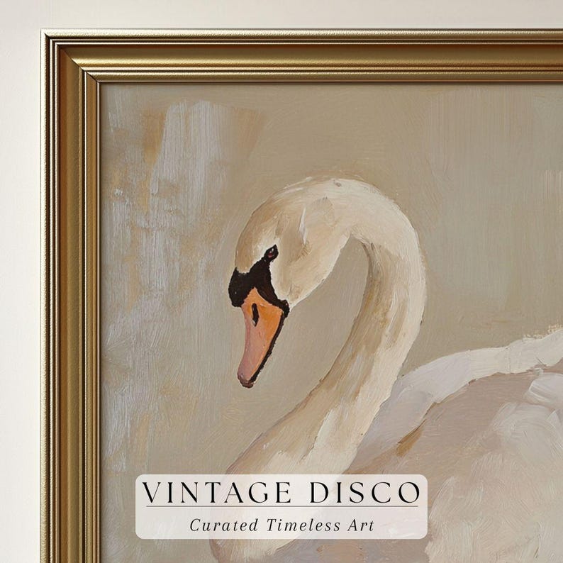 May include: A framed painting of a swan with a curved neck and white feathers. The swan has a black and orange beak and is set against a neutral background. The frame is gold. Text on the painting reads "VINTAGE DISCO" and "Curated Timeless Art."