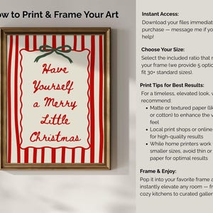 May include: A framed print with the text "Have Yourself a Merry Little Christmas" in red script on a cream background. The print has a red and white striped border and a green bow at the top. The frame is gold.