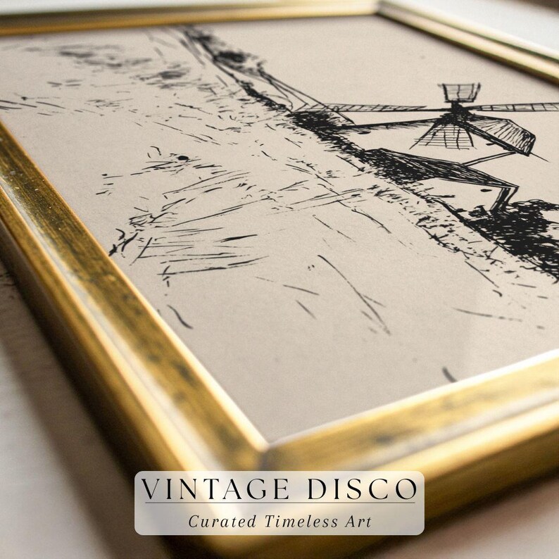 May include: A framed black and white sketch of a windmill and landscape. The artwork is in a gold-colored frame. The text "VINTAGE DISCO" and "Curated Timeless Art" is at the bottom of the image.