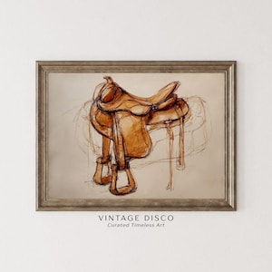 May include: A framed print featuring a sketch of a brown leather saddle. The artwork has a vintage aesthetic, with visible pencil lines and shading. The text "VINTAGE DISCO Curated Timeless Art" is at the bottom.