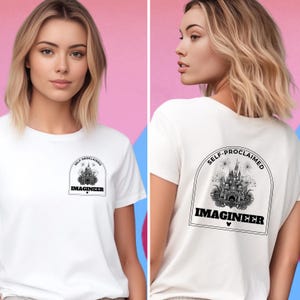 May include: White t-shirt with a black graphic of Cinderella's castle and the text "Self-Proclaimed Imagineer".