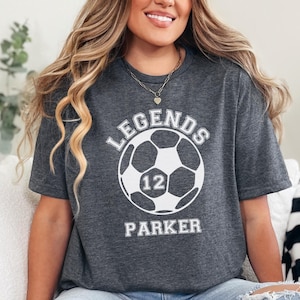 This image consists of a Custom Soccer design for the heather dark gray t-shirt.