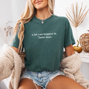 This image is made of the A Lot Can Happen In Three Days design for the blue spruce shirt.