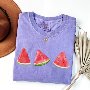 This image consists of Watermelon design for violet shirt.