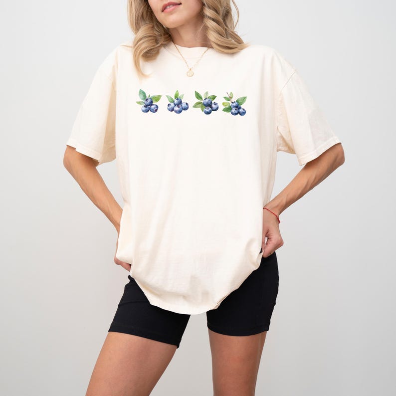This image consists of Blueberry design for ivory shirt.