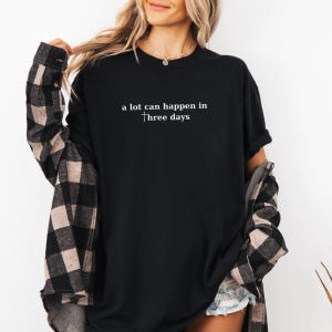 This image is made of the A Lot Can Happen In Three Days design for the black shirt.