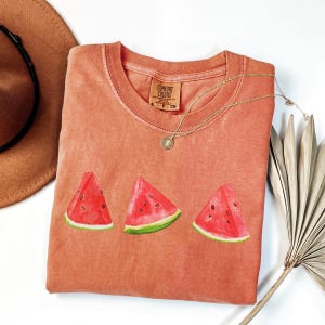 This image consists of Watermelon design for yam shirt.