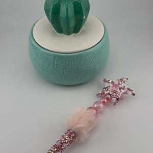 prachtige roze strassteen pompon kralenpen met een prachtige roze ster en bijpassende kralen.