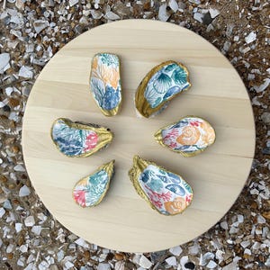 Tropic Treasure Oyster Dish: Oyster shells found off the coast of VA Beach & OBX with a colorful under-the-sea print and gold detailing.