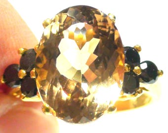 Anillo de topacio imperial 100% natural de 9,0 quilates en oro y plata de ley 925. Talla 7,75.