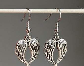Angel wing ethereal silver antique charm earrings
