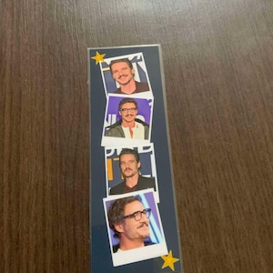 以下が含まれることがあります： 眼鏡とひげを生やした男性の画像が4つあるブックマーク。各画像は白い枠で囲まれ、角に金色の星があります。