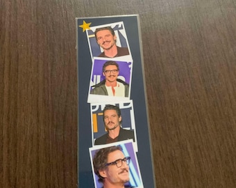 May include: A bookmark with four images of a man with glasses and a beard. Each image is framed in a white border with a gold star in the corner.
