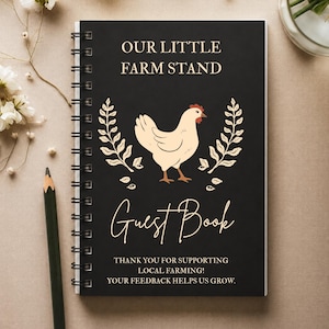 May include: A black spiral-bound guest book featuring the text "OUR LITTLE FARM STAND" and "Guest Book" in white and gold lettering. A central illustration of a cream-colored chicken is flanked by two wheat stalks, with "THANK YOU FOR SUPPORTING LOCAL FARMING! YOUR FEEDBACK HELPS US GROW." printed at the bottom.
