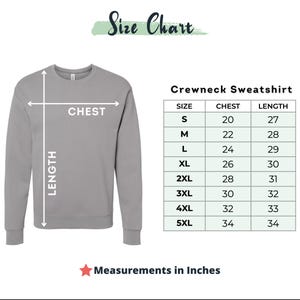 a crewneck sweatshirt with measurements in inches, including chest, waist, and length.