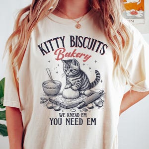Comfort Colors® Kitty Biscuits Bakery Shirt, Kitten Baker Shirt, Cute Cat Shirt, Funny Cat Mom Gift Shirt, Baking Cat Shirt, We Knead Em Tee