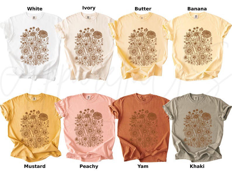 Pode incluir: Uma cole&ccedil;&atilde;o de oito camisetas de manga curta em v&aacute;rias cores: branco, marfim, manteiga, banana, mostarda, p&ecirc;ssego, inhame e c&aacute;qui. Cada camisa apresenta um desenho floral marrom na frente, com os nomes das cores abaixo.