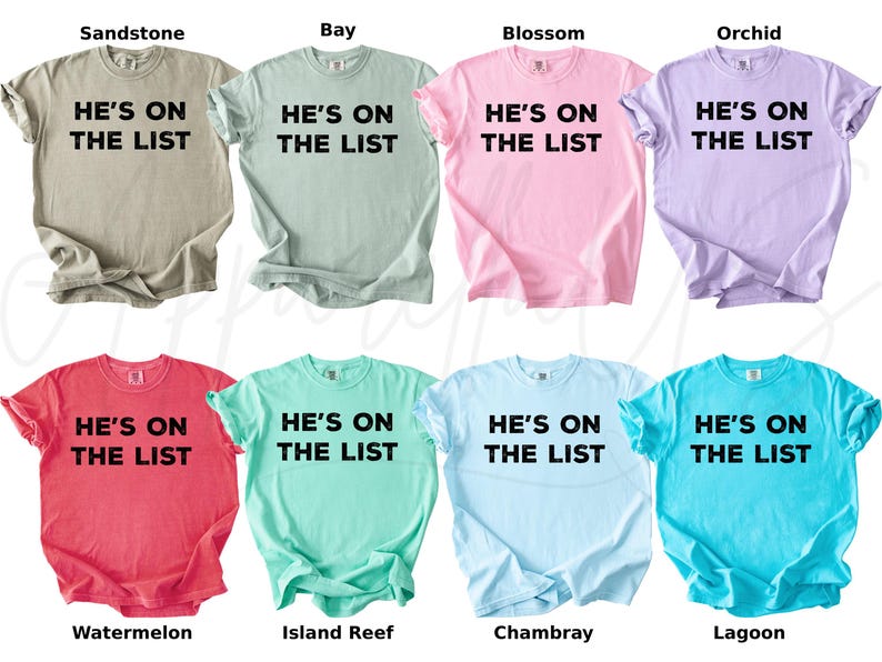 May include: Eight t-shirts in a range of colours, such as beige, pale green, pink, and lilac. Each shirt features the text "HE'S ON THE LIST" in bold black lettering. The shirts are labelled with colour names.
